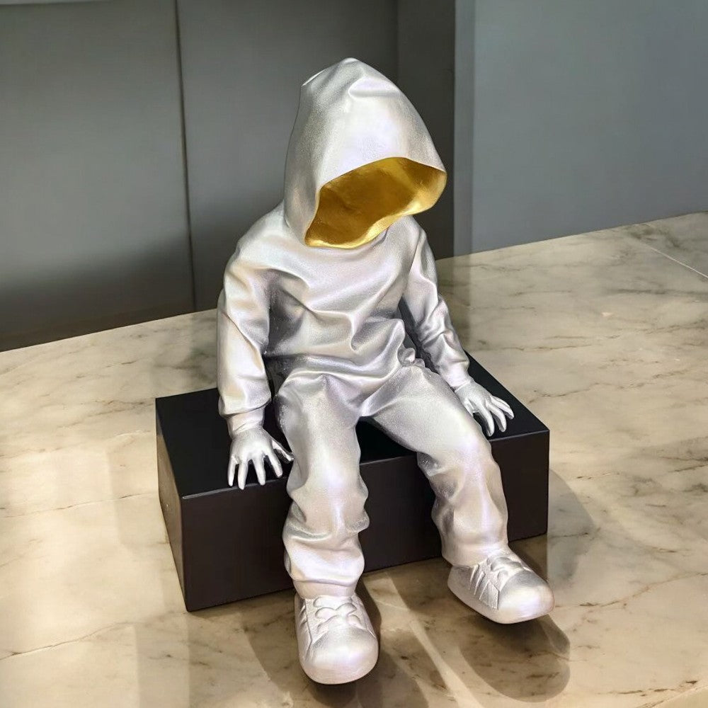 Adorno Sitting Spaceman silver/gold 35cm